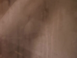 The mature stepmother figure, Gigi Dior, is now tending to a large new phallus.