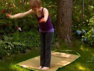 Eliza trys out yoga, hairy style in this outside videos, sure to